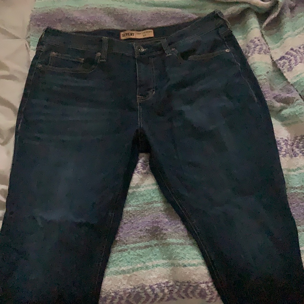Never worn dark blue jeans 36 x 32.  Fit is slim straight fit